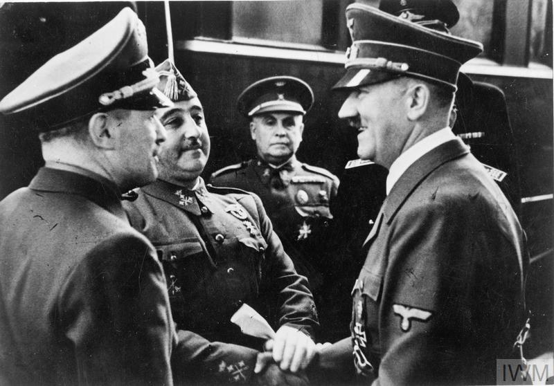 Adolf Hitler greets Francisco Franco in Hendaye near the Spanish border. The meeting could not take place in Spain as the Spanish railways did not have the same size as the French ones at the time, both trains had to stop at each country's border